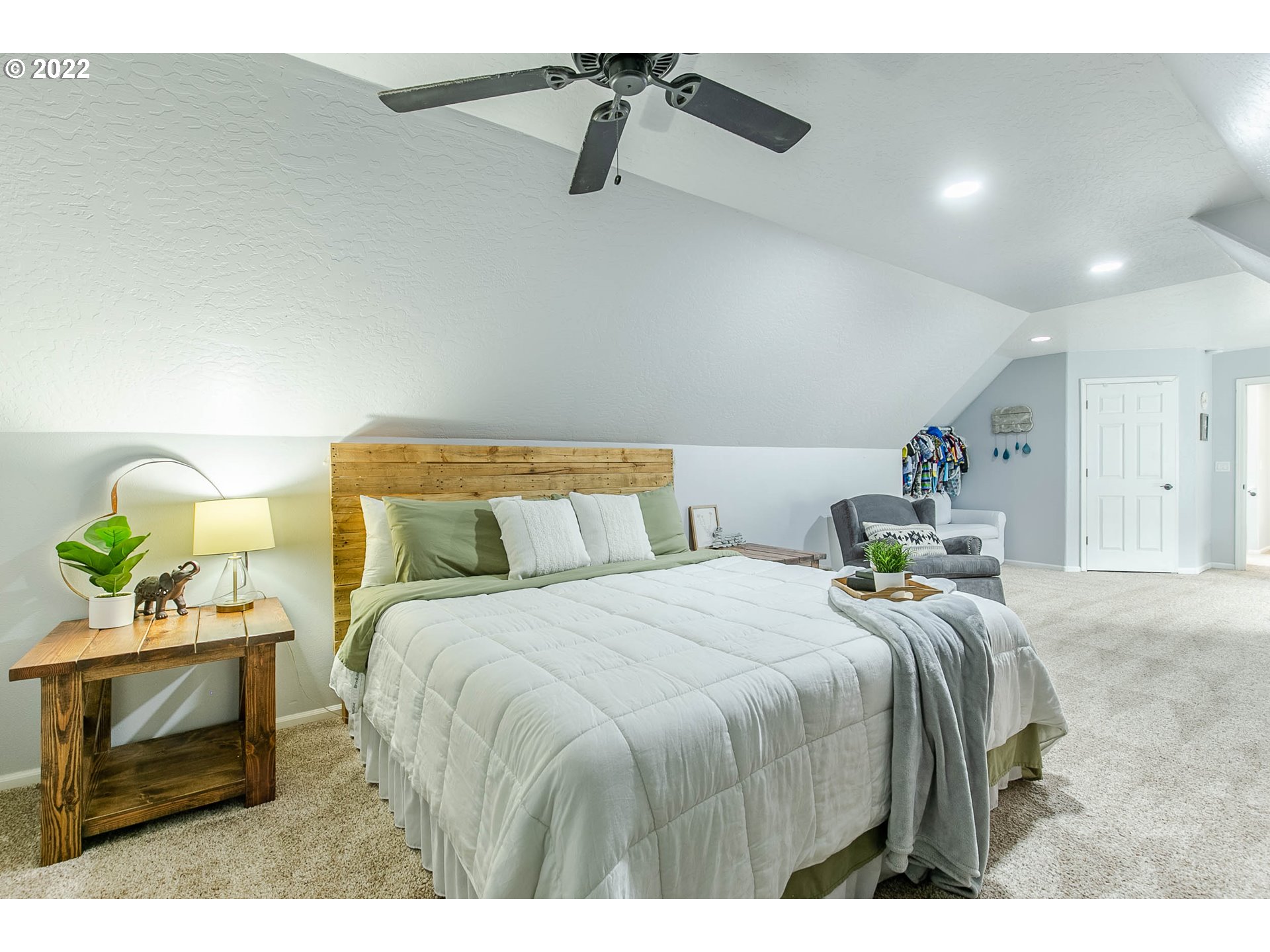 126 South 72nd Street Springfield, OR 97478 - Photo 21 of 32 a bedroom with a bed table and window