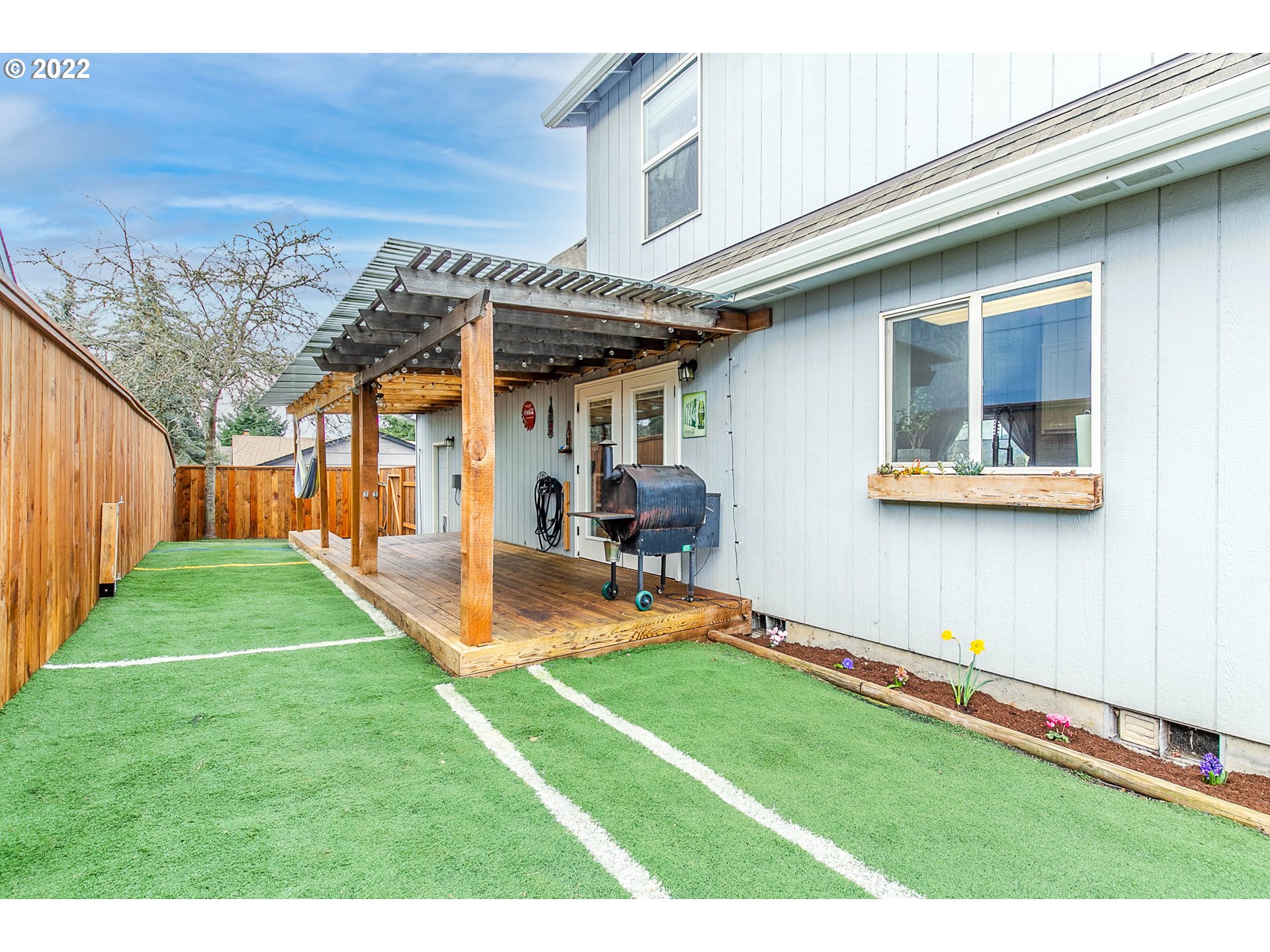 126 South 72nd Street Springfield, OR 97478 - Photo 29 of 32 a backyard of a house with table and chairs