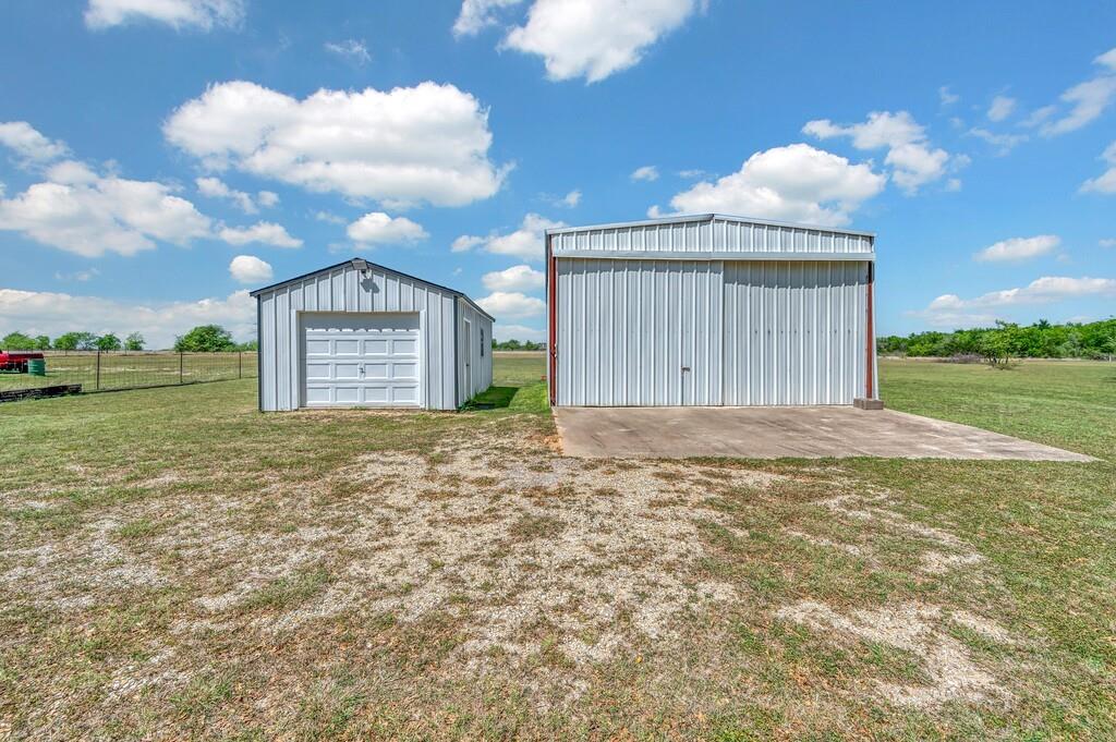 2857 Country Spring Road Lorena, TX 76655 - Photo 25 of 40 View of pole building featuring a lawn