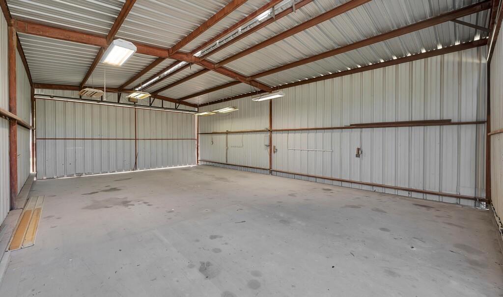 2857 Country Spring Road Lorena, TX 76655 - Photo 27 of 40 Garage featuring metal wall