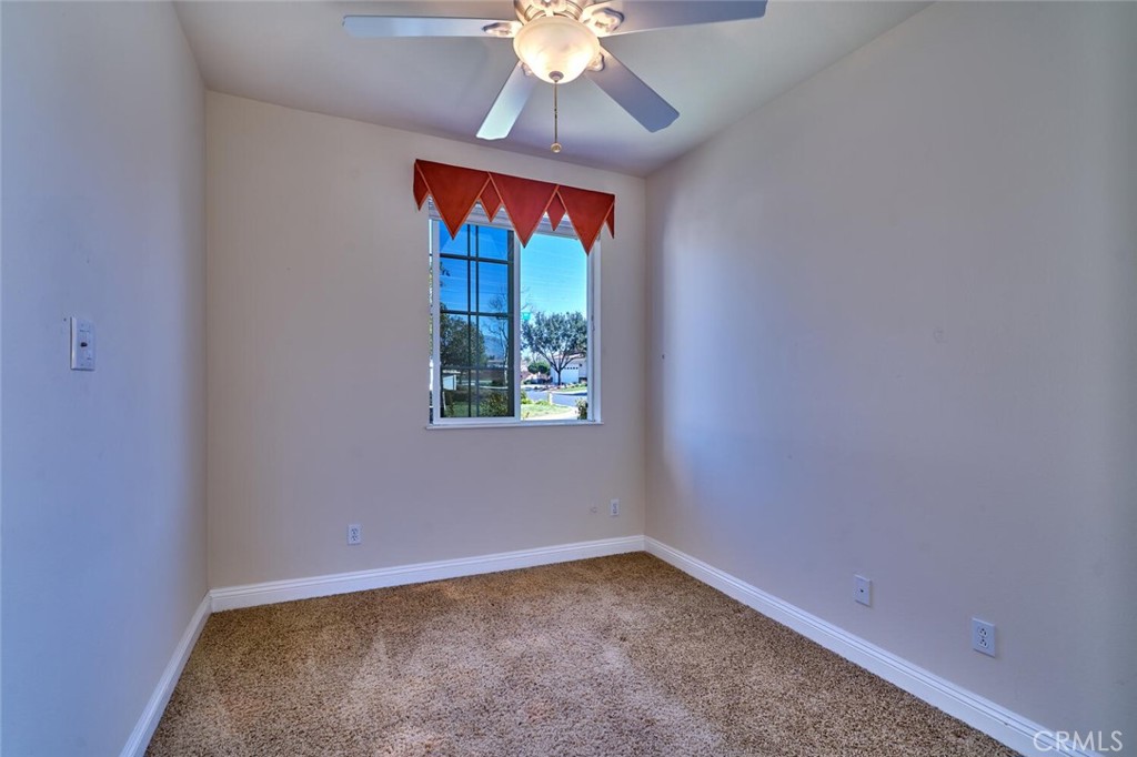 1143 Saguara Road Beaumont, CA 92223 - Photo 47 of 66 a view of an empty room with a window