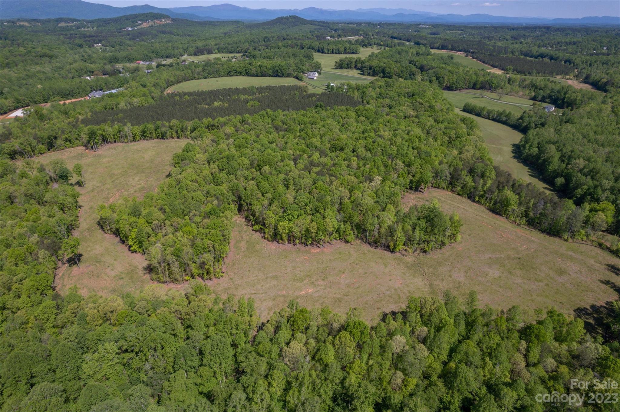 0 Collinsville Road Columbus, NC 28722 - Photo 33 of 48 an aerial view of mountains residential house and green space