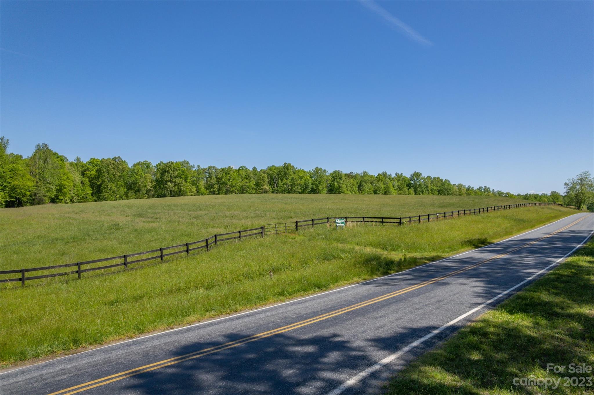 0 Collinsville Road Columbus, NC 28722 - Photo 46 of 48 a view of a lake with a big yard
