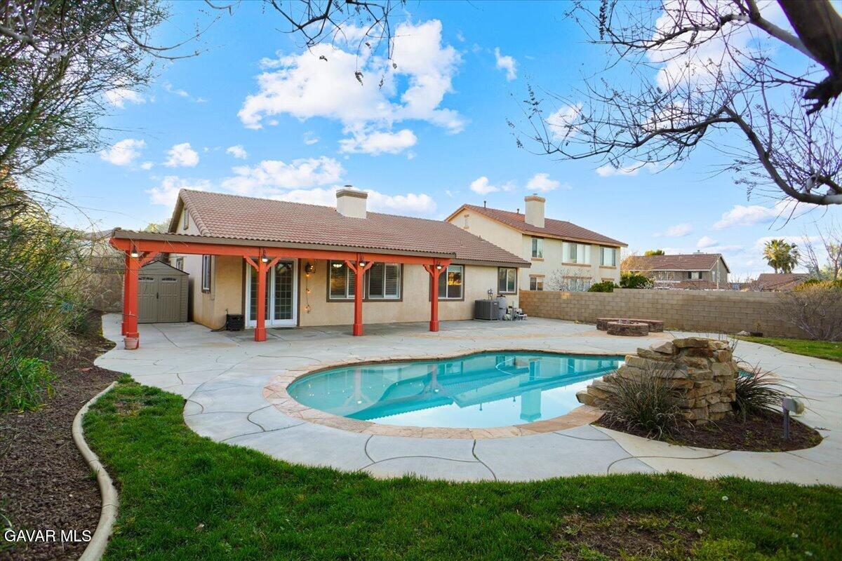 40308 Bolz Ranch Road Palmdale, CA 93551 - Photo 6 of 29 a front view of a house with swimming pool