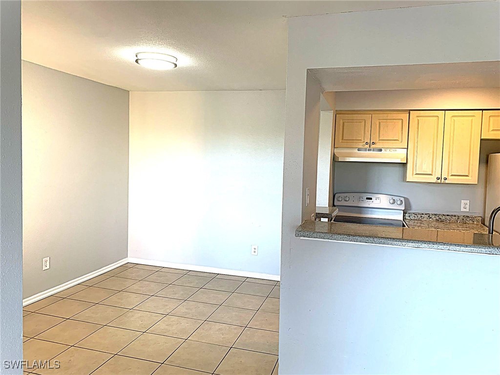 2929 Winkler Avenue, Unit 1018 Fort Myers, FL 33916 - Photo 11 of 34 a bathroom with a sink and a mirror