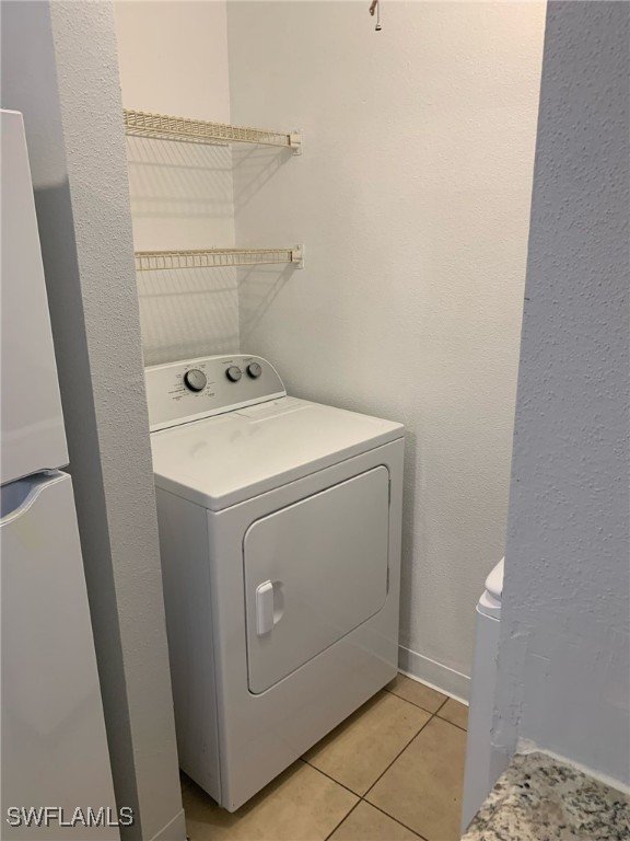 2929 Winkler Avenue, Unit 1018 Fort Myers, FL 33916 - Photo 27 of 34 a utility room with dryer and washer