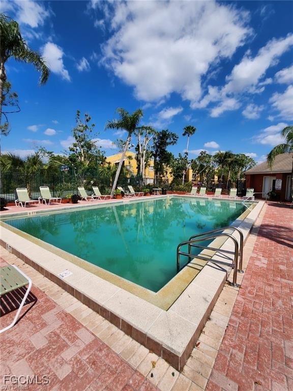 2929 Winkler Avenue, Unit 1018 Fort Myers, FL 33916 - Photo 3 of 34 a view of a terrace with a yard