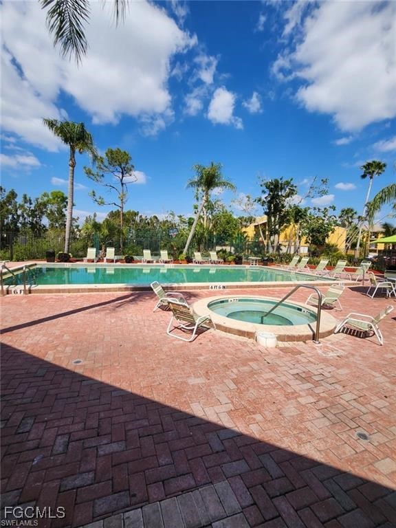 2929 Winkler Avenue, Unit 1018 Fort Myers, FL 33916 - Photo 4 of 34 a view of a tennis ground