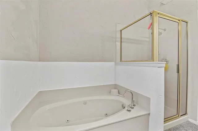 a bathroom with a bathtub