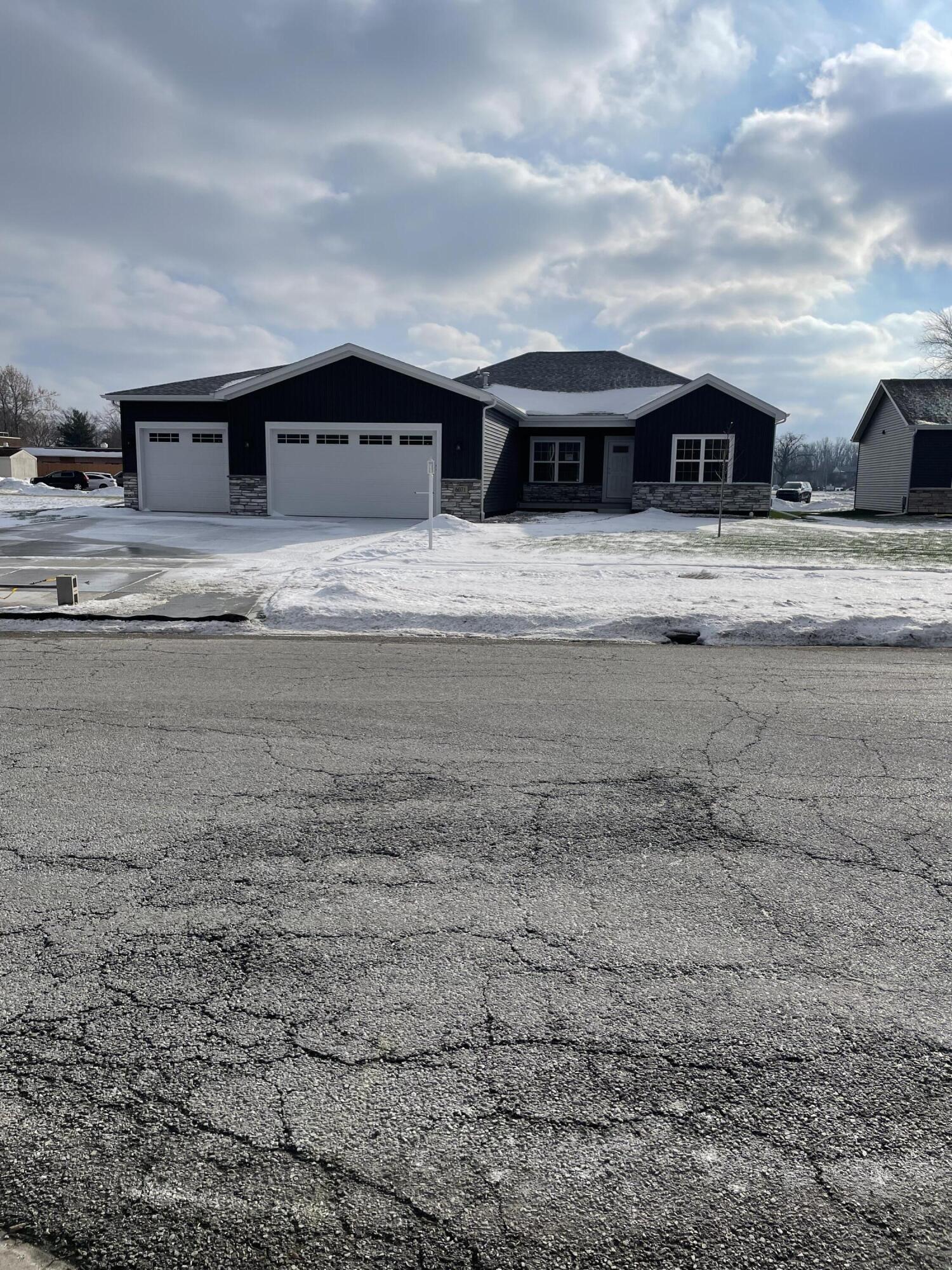 a house view with a backyard space