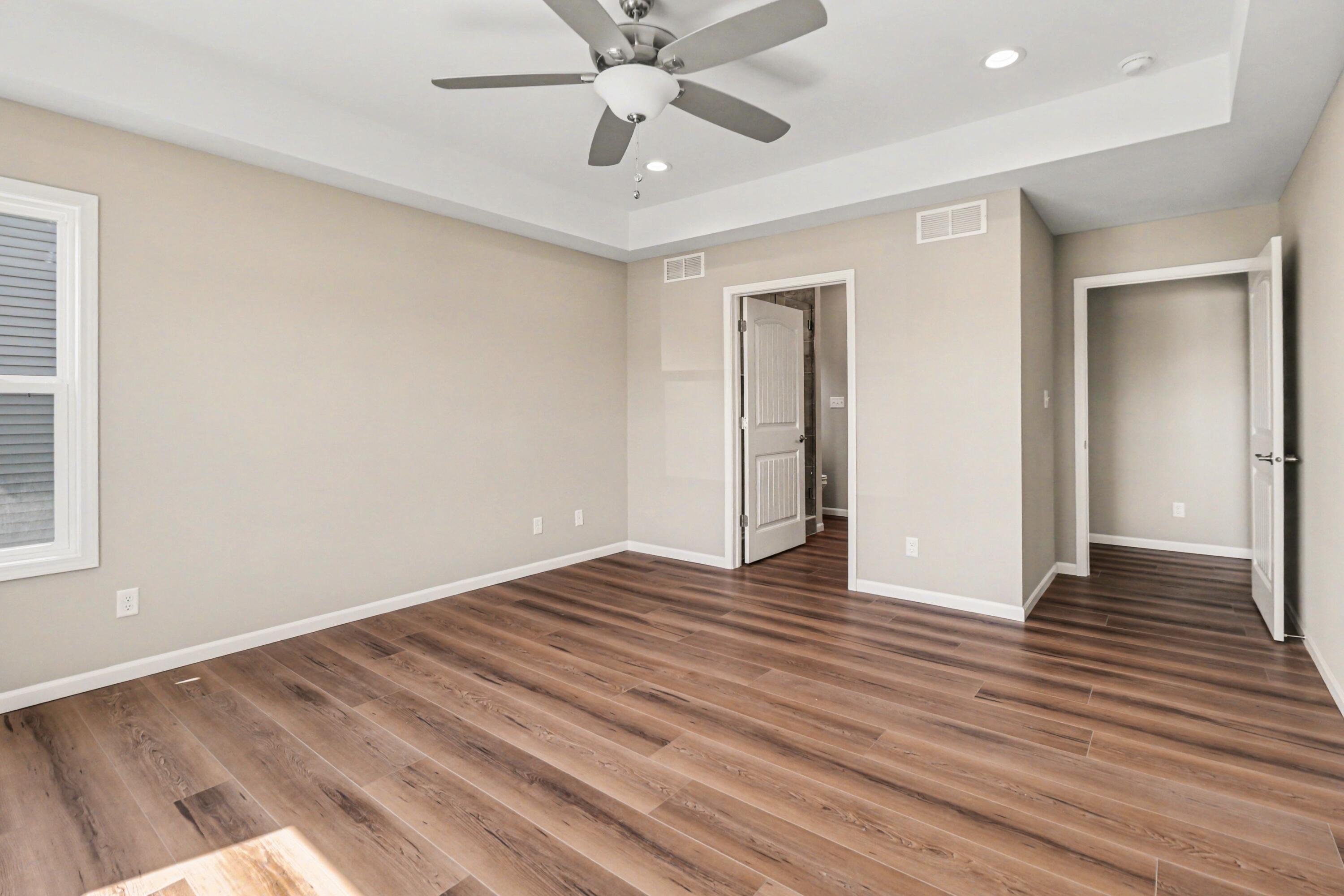 6071 Robbins Road Portage, IN 46368 - Photo 6 of 14 wooden floor in an empty room with a window