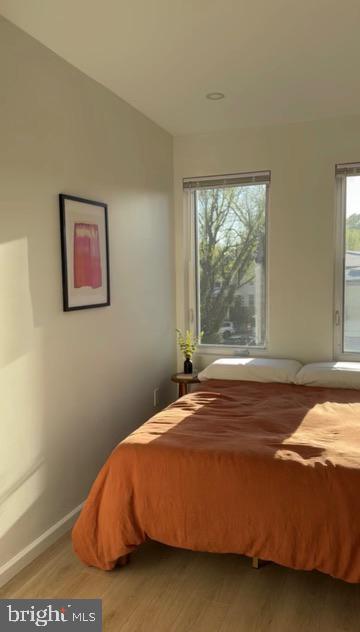 5326 9th Street Northwest Washington, DC 20011 - Photo 23 of 38 a bedroom with a bed and a window