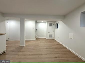 5326 9th Street Northwest Washington, DC 20011 - Photo 30 of 38 a view of an empty room with wooden floor
