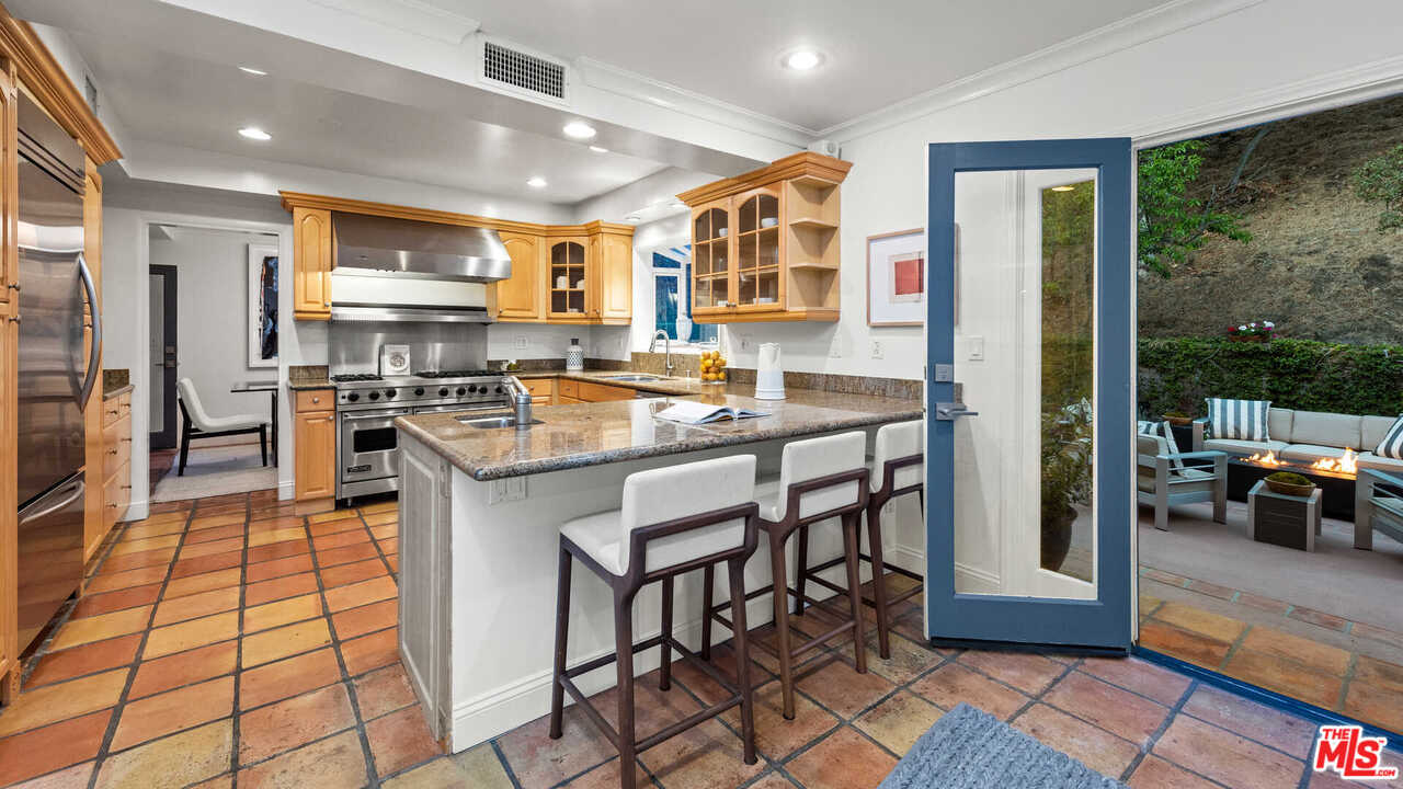 3944 Mandeville Canyon Road Los Angeles, CA 90049 - Photo 2 of 39