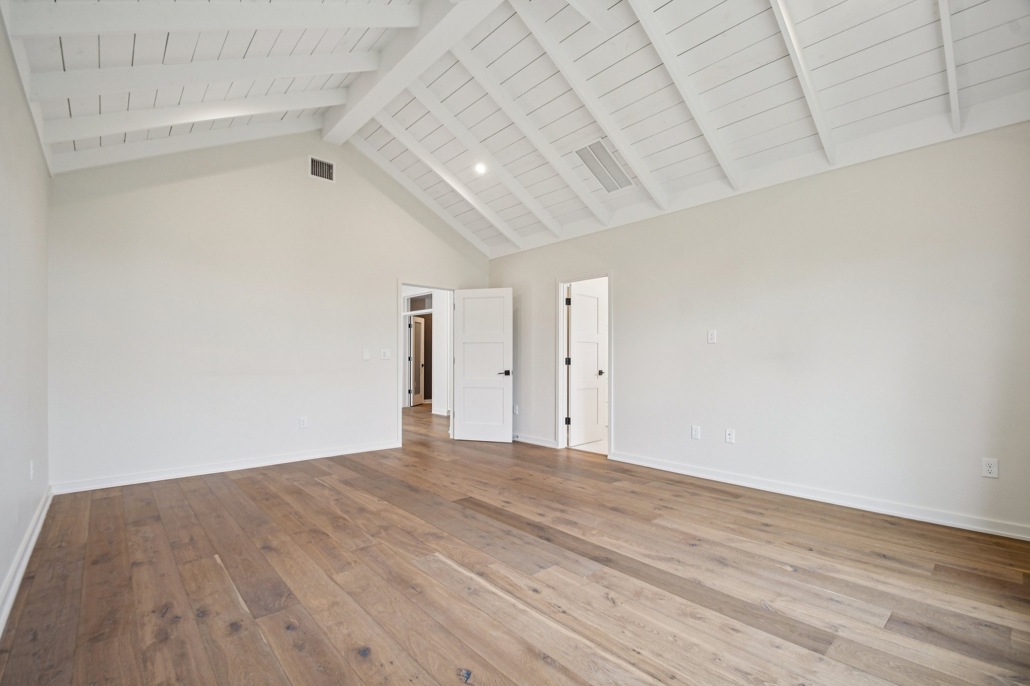 2518 Watkins Way Austin, TX 78746 - Photo 16 of 28 a view of empty room with wooden floor