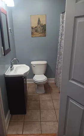 a bathroom with a sink and a toilet