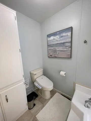 a utility room with cabinets
