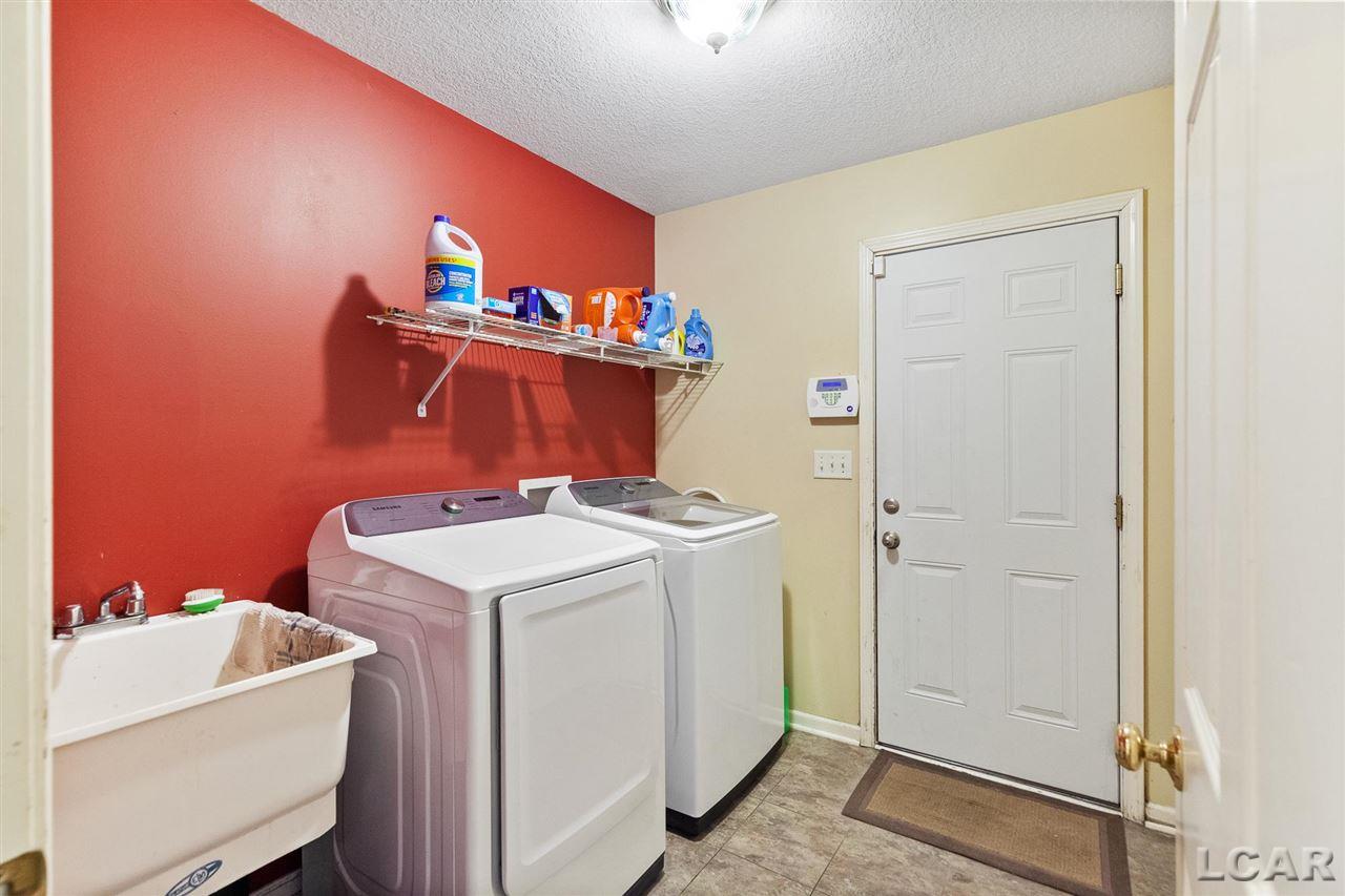 3169 Cobblestone Ridge Tecumseh, MI 49286 - Photo 7 of 23 Laundry room/garage acces