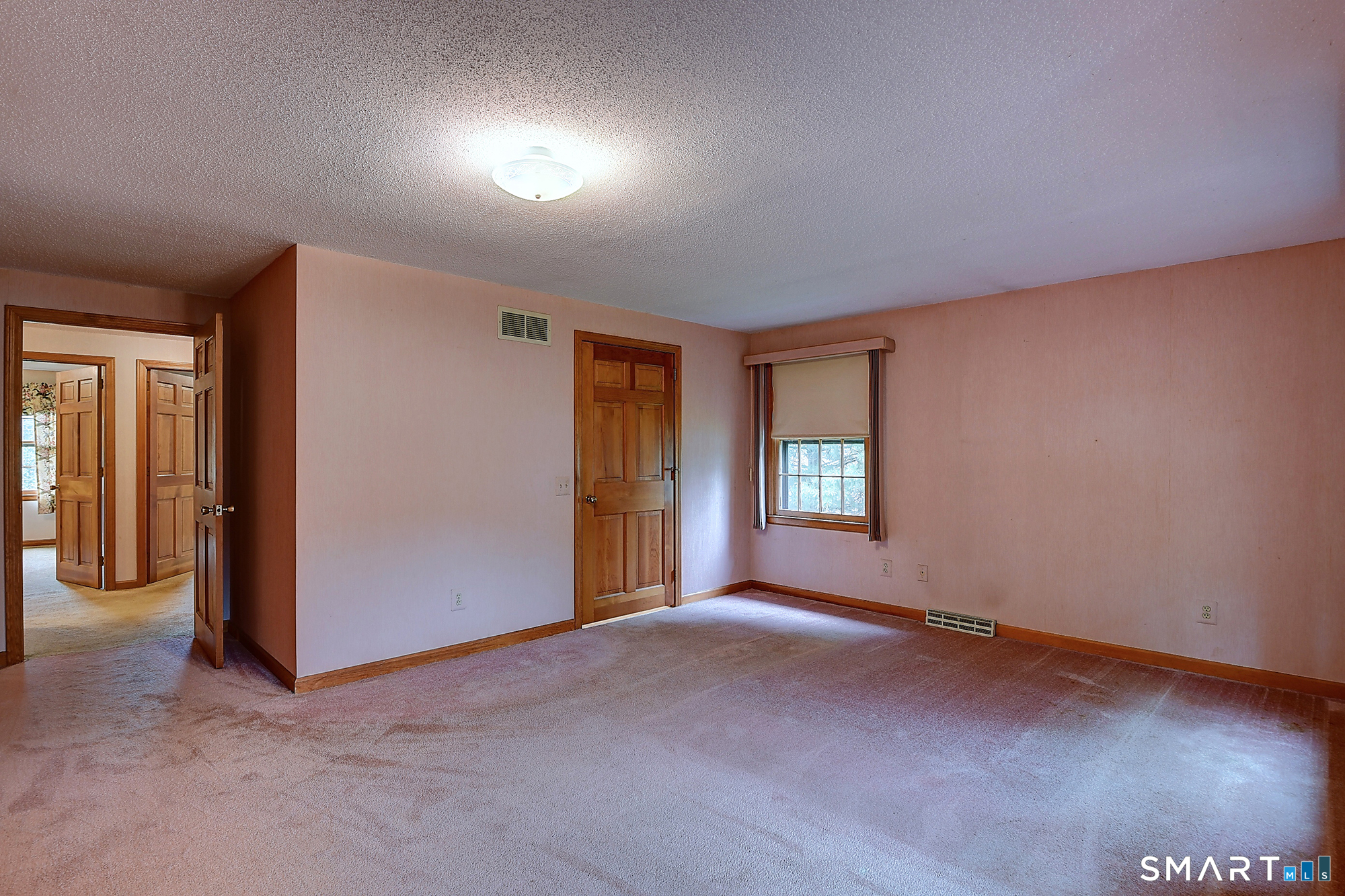 80 Grist Mill Road Wethersfield, CT 06109 - Photo 25 of 40 an empty room with windows