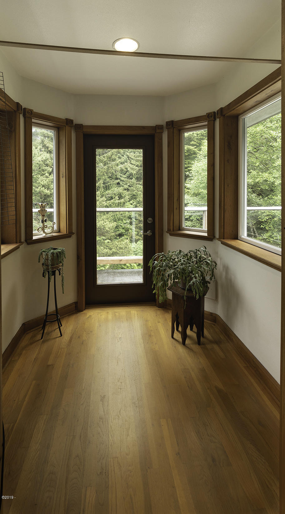 122 Reeves Circle Yachats, OR 97498 - Photo 20 of 40 Master BR to deck