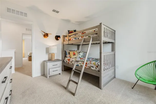 a bathroom with a toilet and a bathtub