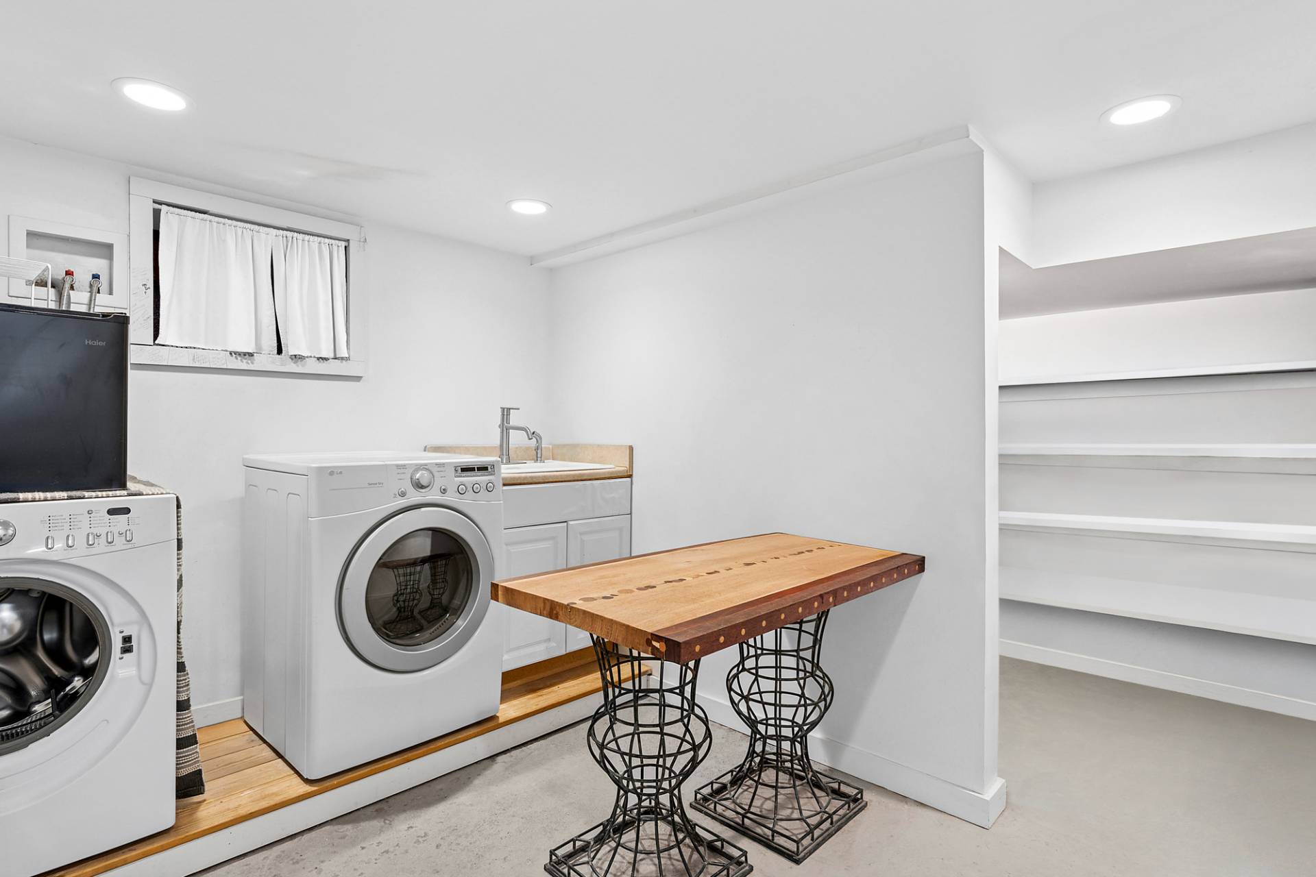 229 Water Mill Towd Road Water Mill, NY 11976 - Photo 27 of 35 a view of a storage and utility room with washer and dryer