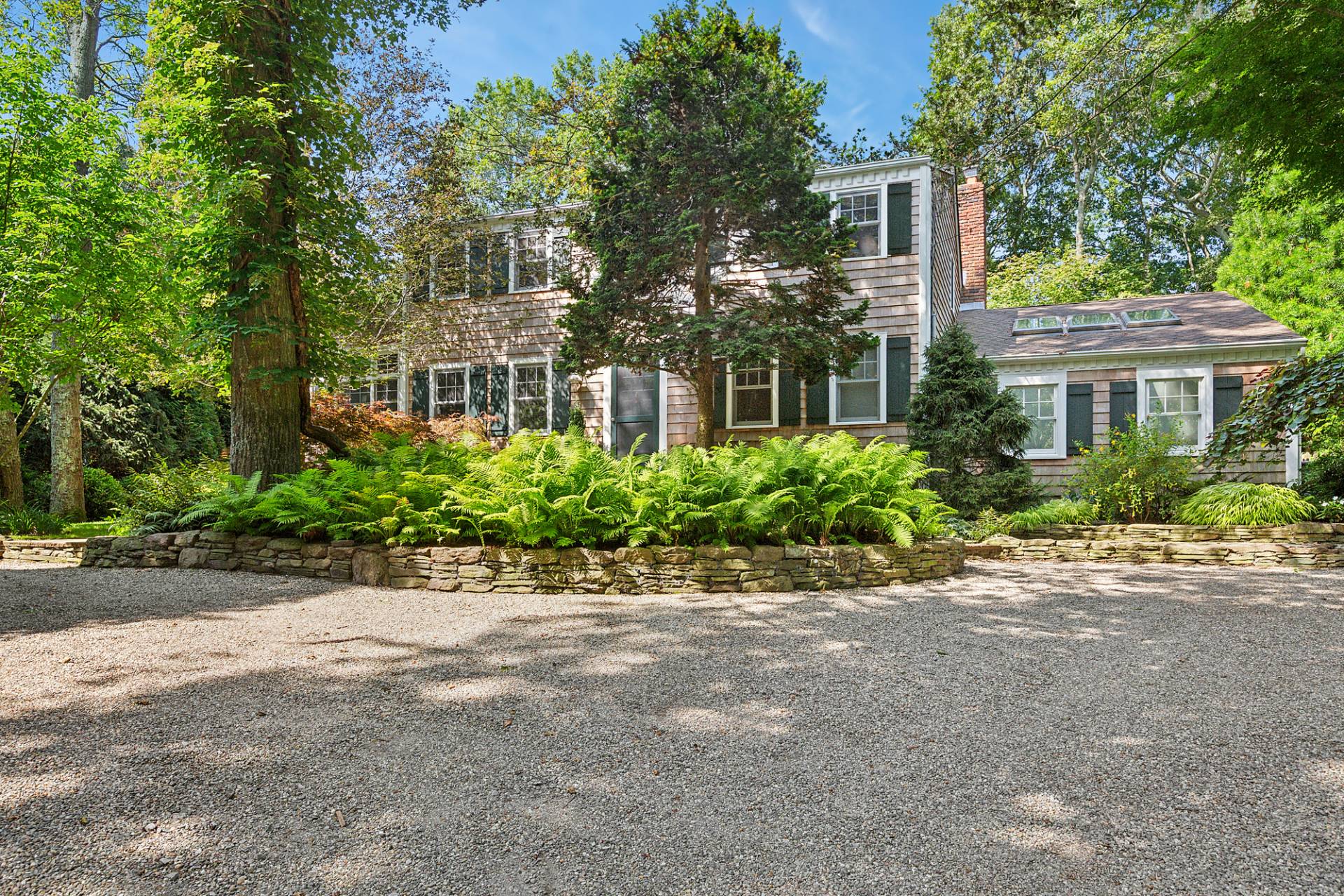 229 Water Mill Towd Road Water Mill, NY 11976 - Photo 34 of 35 front view of house with a yard