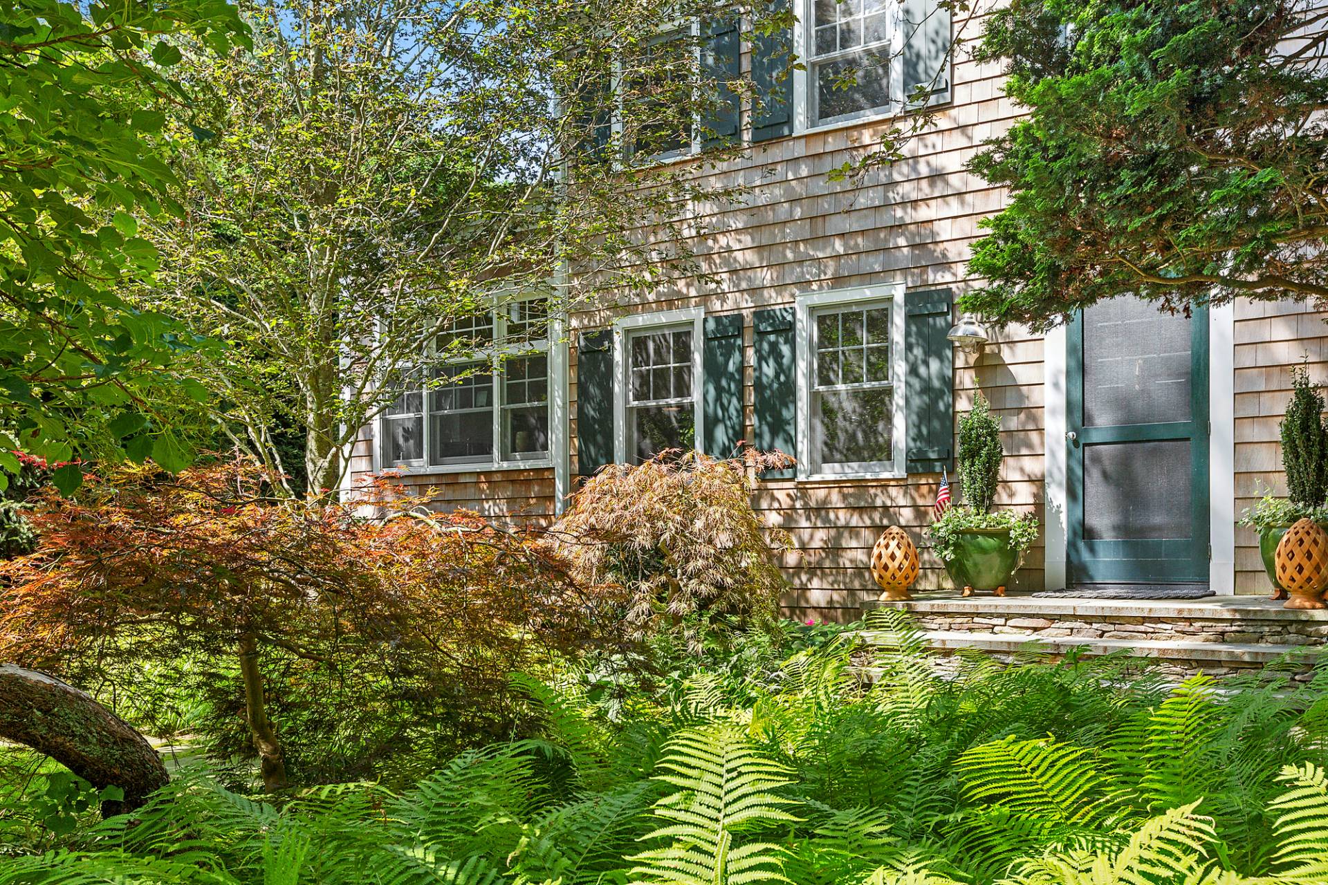 229 Water Mill Towd Road Water Mill, NY 11976 - Photo 4 of 35 a view of a house with a garden