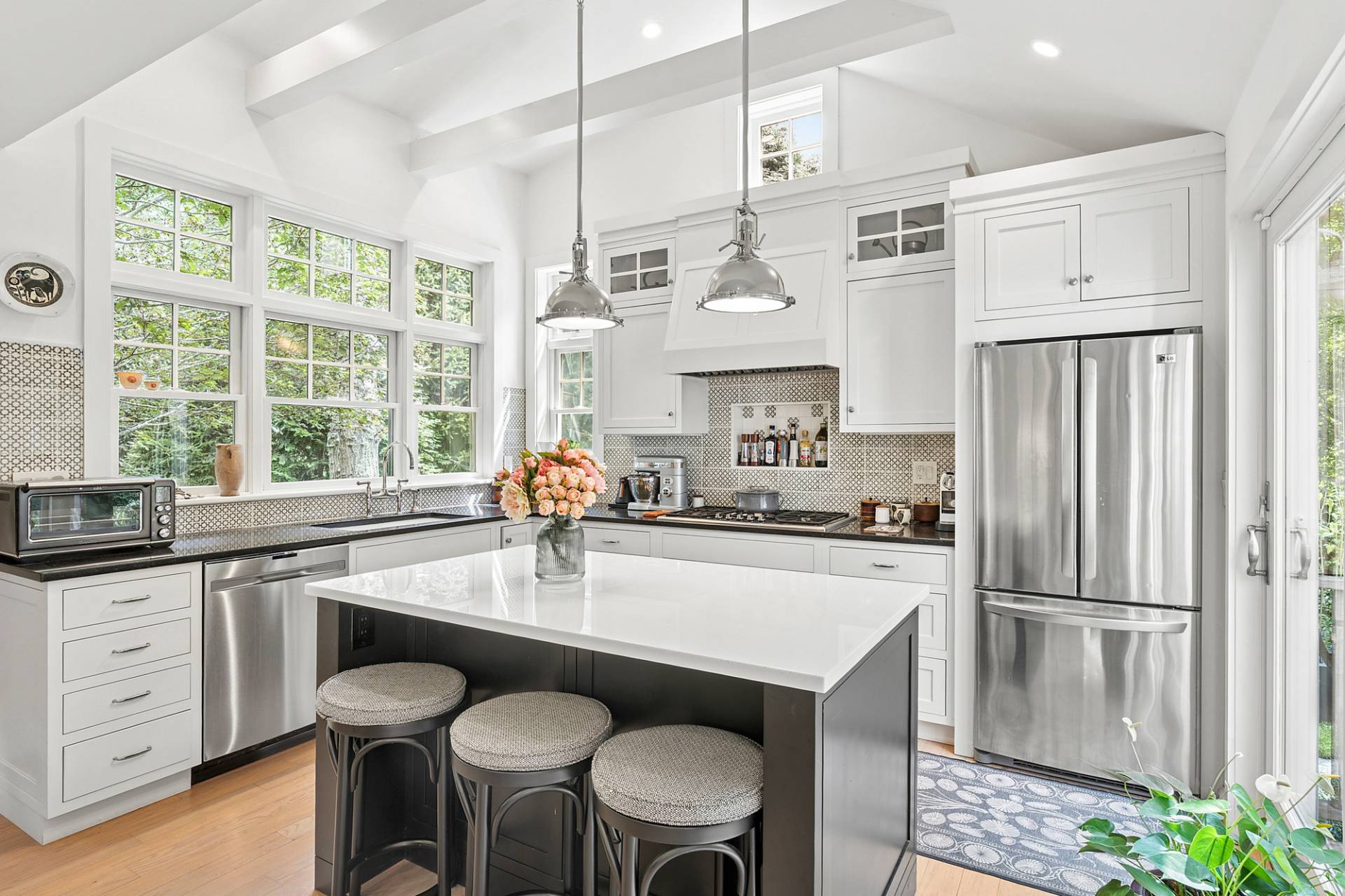 229 Water Mill Towd Road Water Mill, NY 11976 - Photo 6 of 35 a kitchen with granite countertop a sink appliances cabinets and furniture