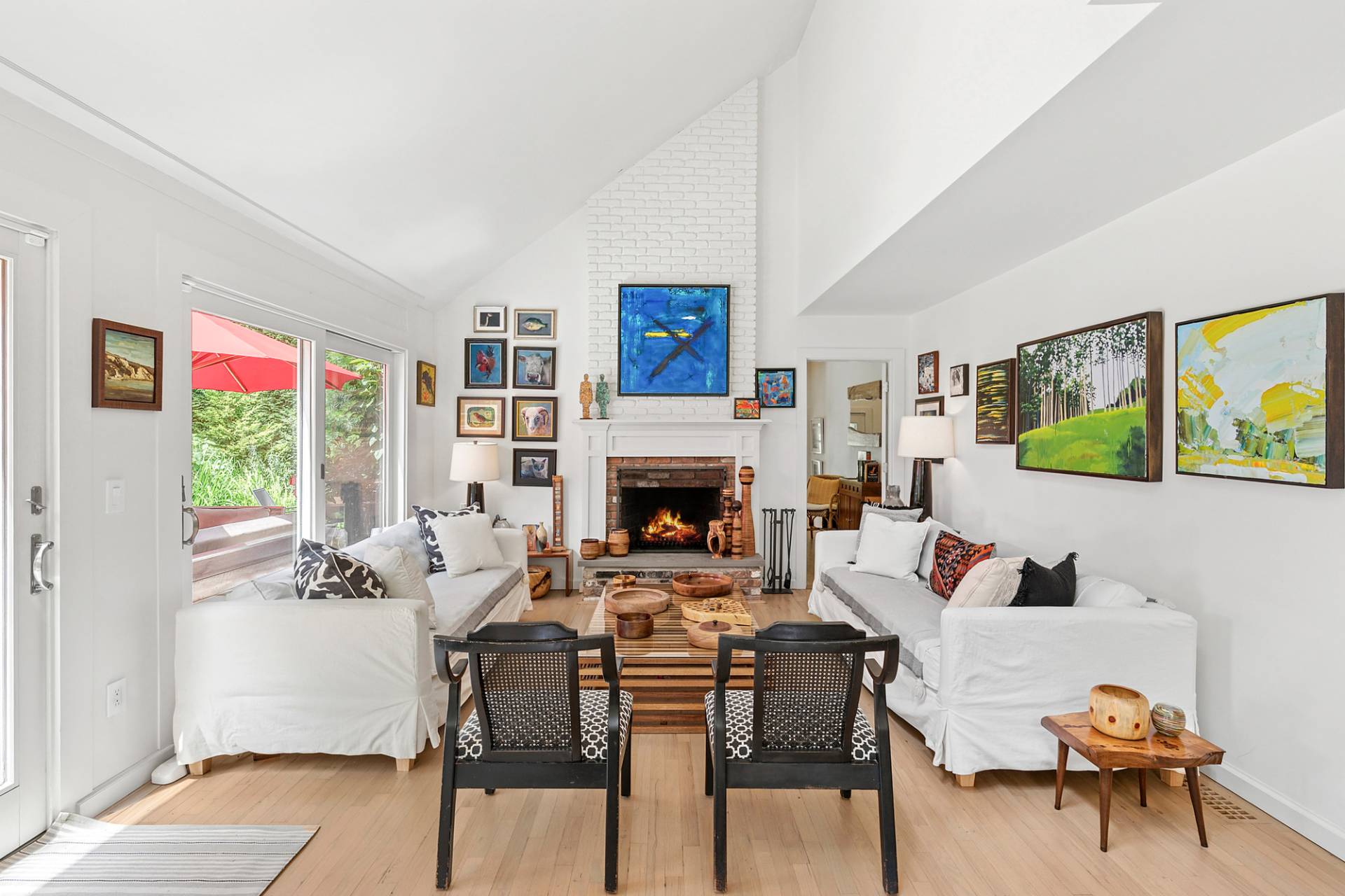 229 Water Mill Towd Road Water Mill, NY 11976 - Photo 10 of 35 a living room with furniture and a fireplace