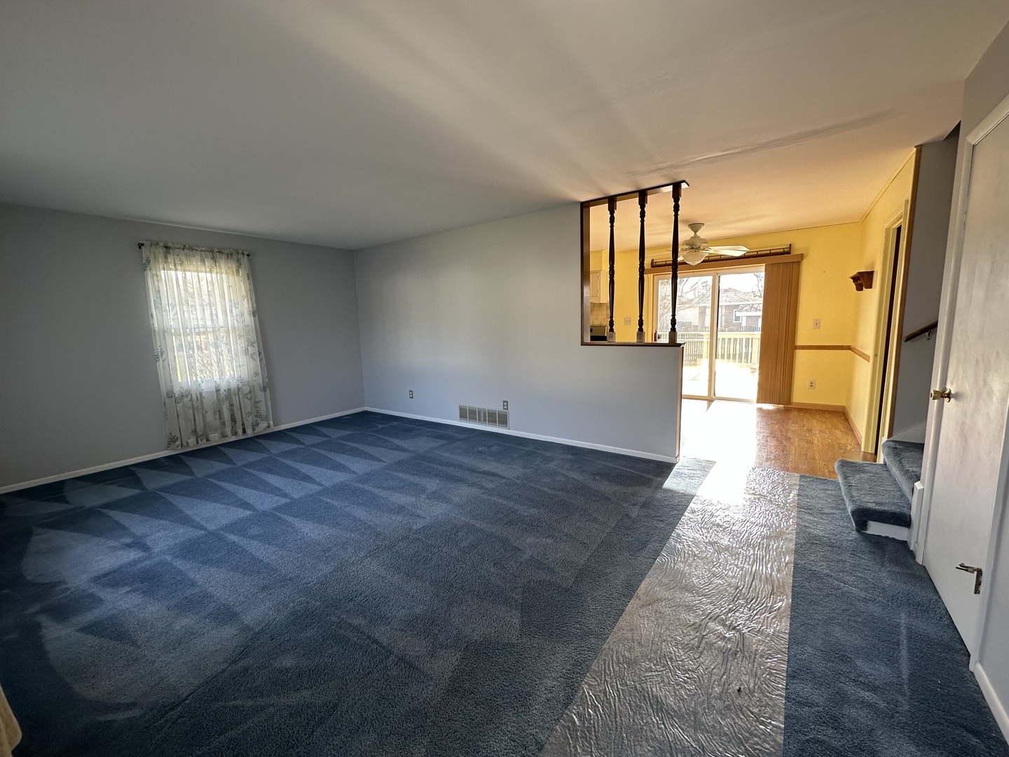 320 Stonegate Road New Lenox, IL 60451 - Photo 5 of 31 wooden floor in an empty room with a window