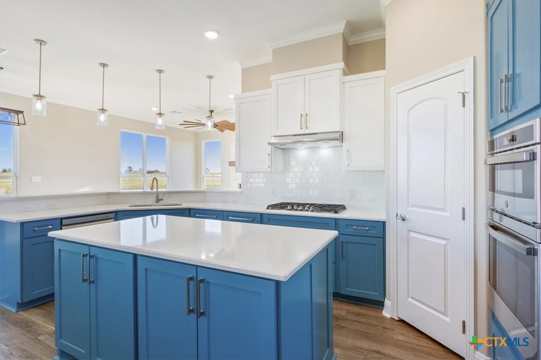14308 Fm 2904 Temple, TX 76501 - Photo 11 of 45 a kitchen with stainless steel appliances granite countertop a refrigerator a sink and a stove
