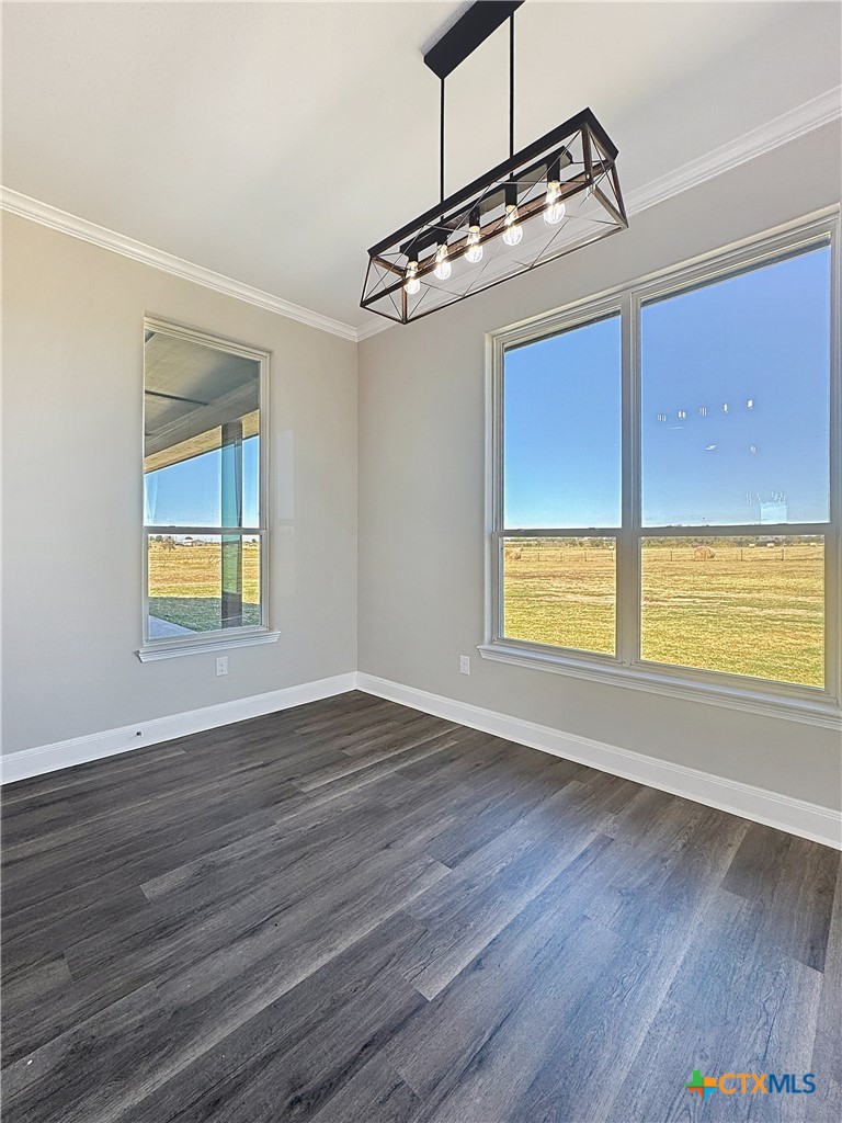 14308 Fm 2904 Temple, TX 76501 - Photo 16 of 45 a view of an empty room with wooden floor and a window