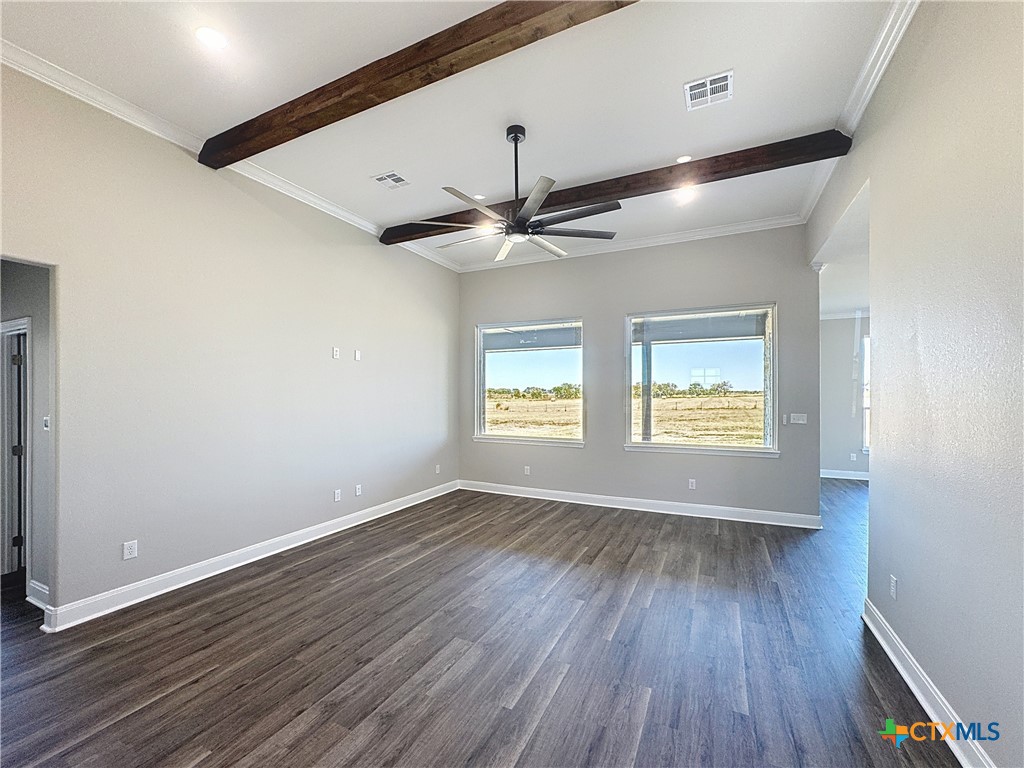 14308 Fm 2904 Temple, TX 76501 - Photo 17 of 45 a view of an empty room with window and wooden floor