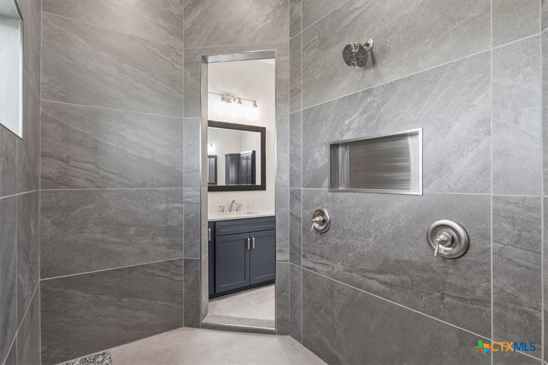 14308 Fm 2904 Temple, TX 76501 - Photo 28 of 45 a bathroom with a shower