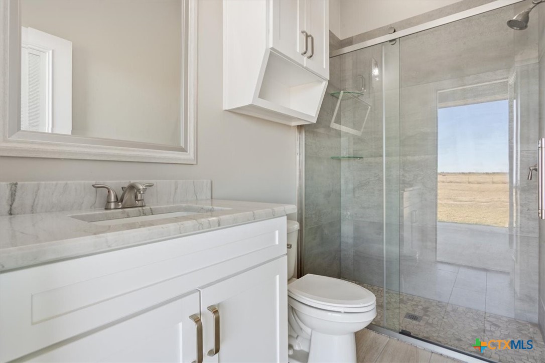14308 Fm 2904 Temple, TX 76501 - Photo 33 of 45 a bathroom with a sink toilet and shower