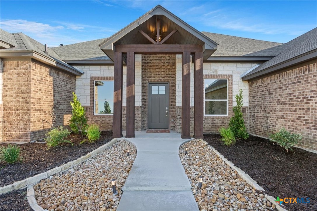 14308 Fm 2904 Temple, TX 76501 - Photo 5 of 45 a front view of a house with garden