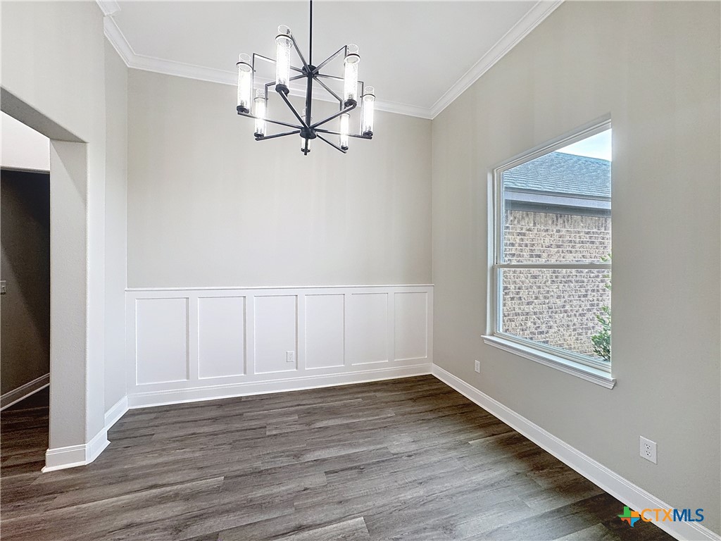 14308 Fm 2904 Temple, TX 76501 - Photo 10 of 45 a view of empty room with wooden floor and fan