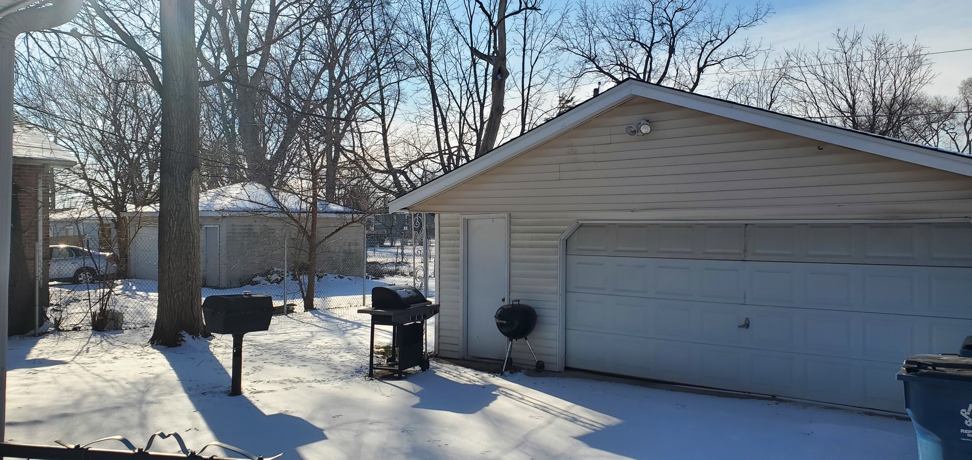 14526 Ridgeway Avenue Midlothian, IL 60445 - Photo 15 of 17 a backyard of a house with outdoor seating
