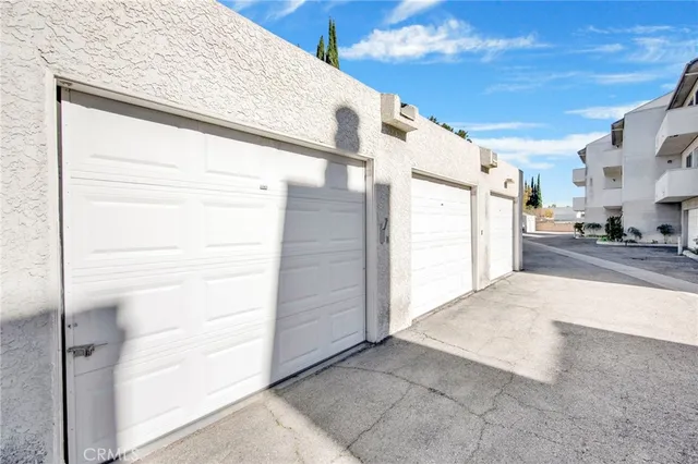 a view of a swimming pool with a lounge chairs