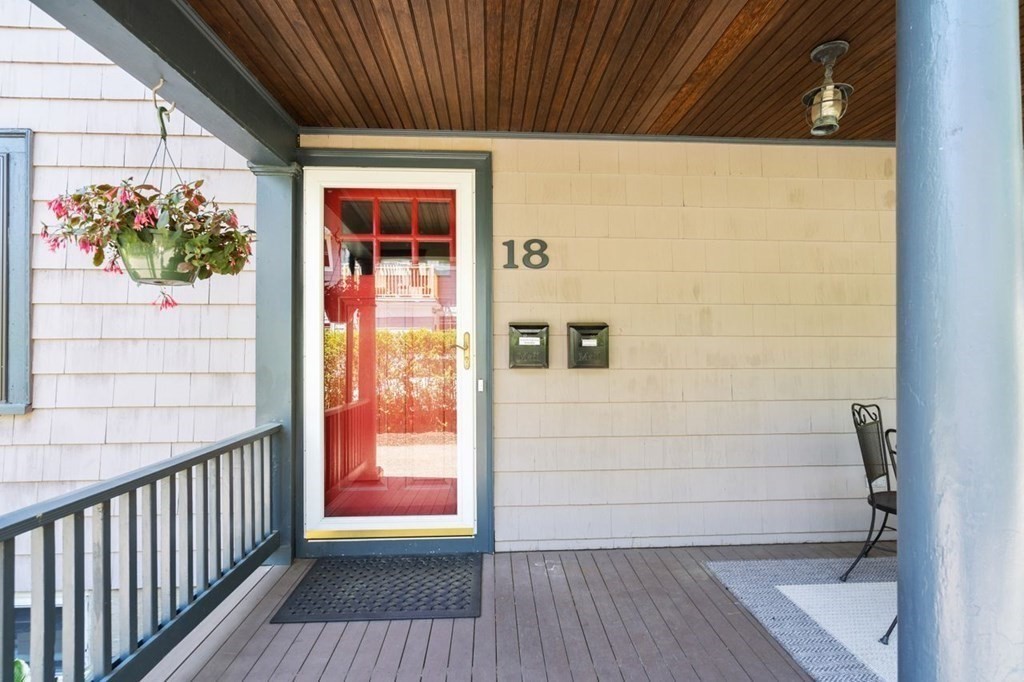 18 Stoneleigh Road, Unit 18 Newton, MA 02465 - Photo 12 of 26 a view of a porch with wooden floor