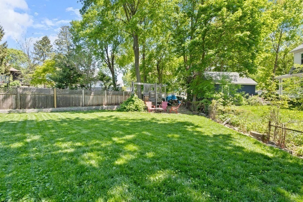18 Stoneleigh Road, Unit 18 Newton, MA 02465 - Photo 17 of 26 a view of outdoor space with deck and green space