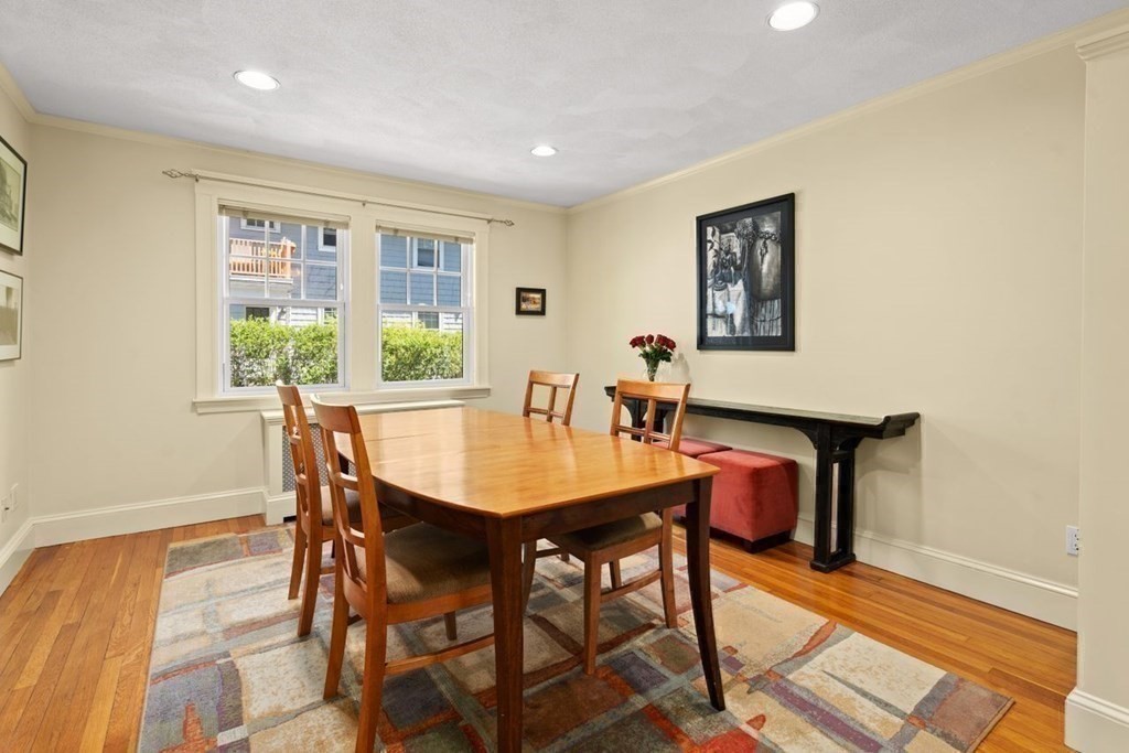 18 Stoneleigh Road, Unit 18 Newton, MA 02465 - Photo 23 of 26 a view of a dining room with furniture and window