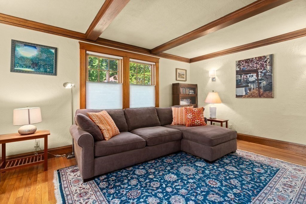 18 Stoneleigh Road, Unit 18 Newton, MA 02465 - Photo 25 of 26 a living room with furniture and a rug