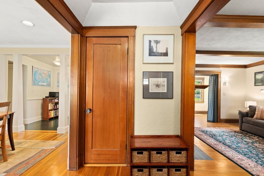 18 Stoneleigh Road, Unit 18 Newton, MA 02465 - Photo 3 of 26 a view of a hallway with furniture and a livingroom