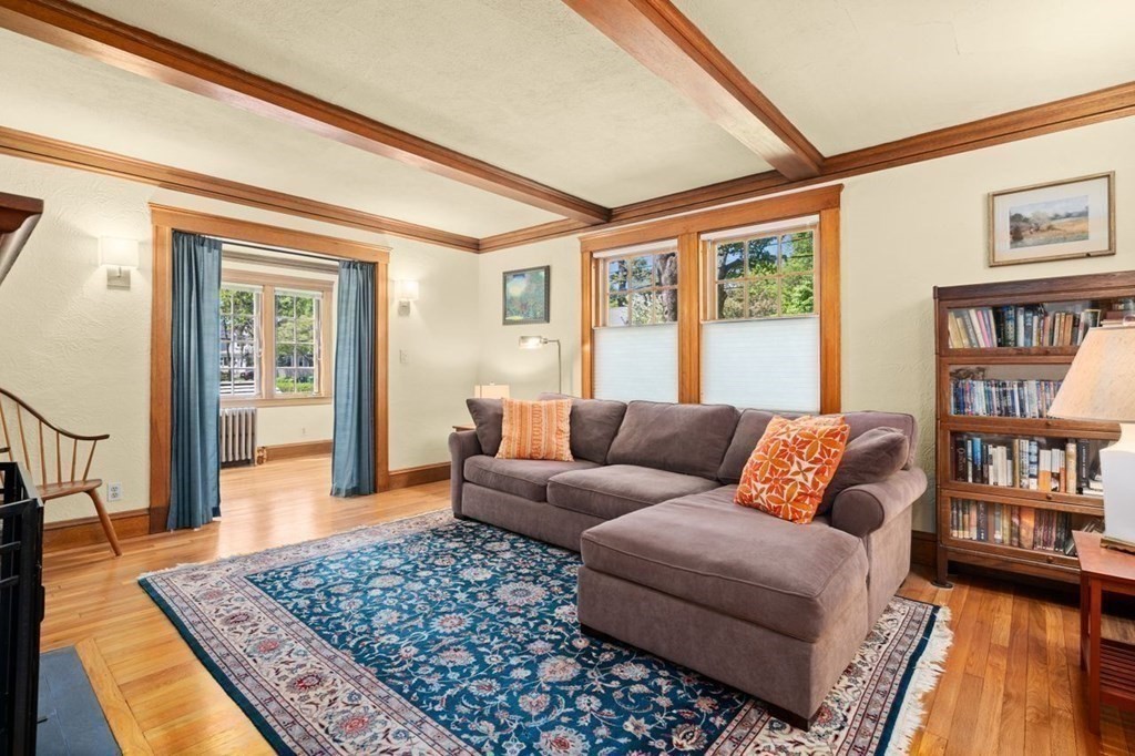 18 Stoneleigh Road, Unit 18 Newton, MA 02465 - Photo 4 of 26 a living room with furniture and a rug
