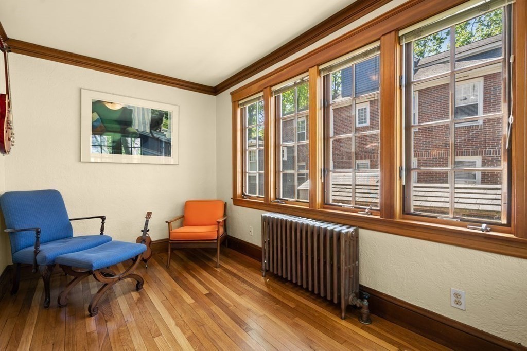 18 Stoneleigh Road, Unit 18 Newton, MA 02465 - Photo 6 of 26 a room with furniture and windows