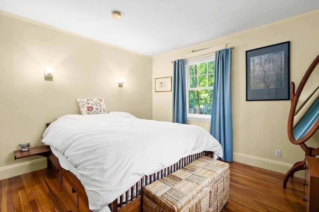 18 Stoneleigh Road, Unit 18 Newton, MA 02465 - Photo 8 of 26 a bedroom with a bed and a window