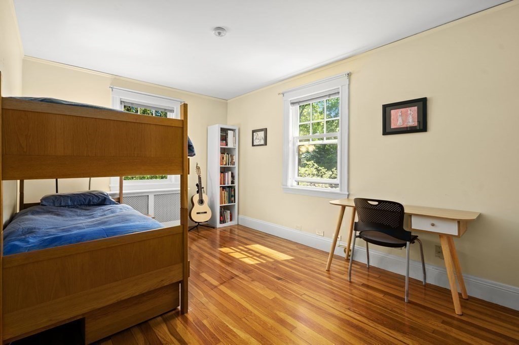 18 Stoneleigh Road, Unit 18 Newton, MA 02465 - Photo 10 of 26 a living room with furniture and a window