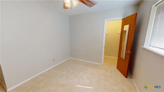 an empty room with a window